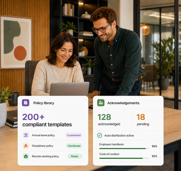 HR policy library and acknowledgements dashboard with two employees reviewing laptop